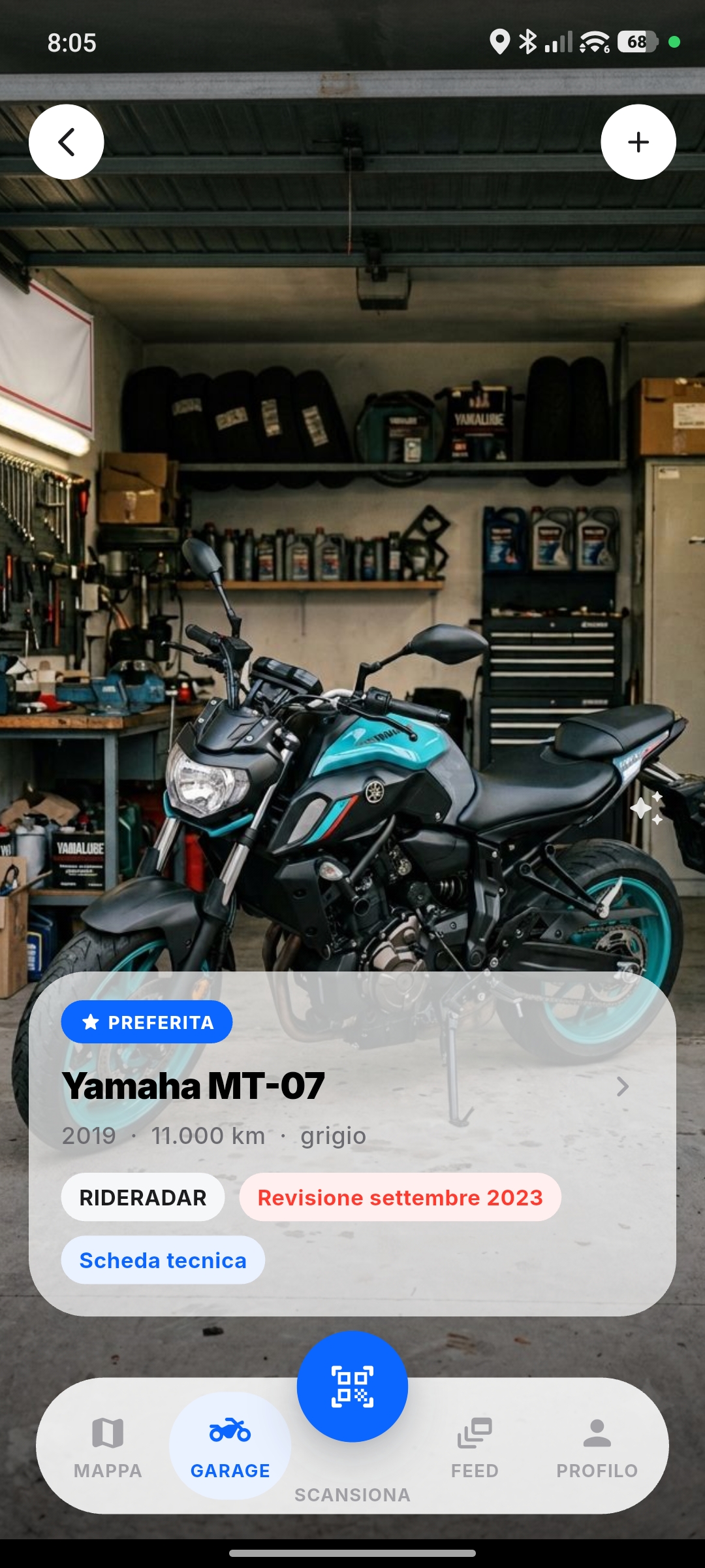 Schermata del garage con la foto della moto, i chilometri percorsi e la scheda tecnica